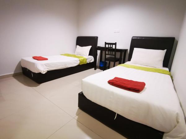 Clover Hotel Port Dickson : photo 1 de la chambre chambre lits jumeaux deluxe