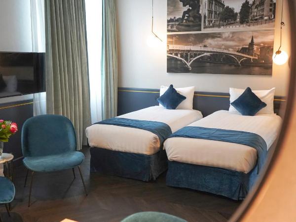 Amosa Liège City Centre Hotel : photo 9 de la chambre chambre lits jumeaux deluxe