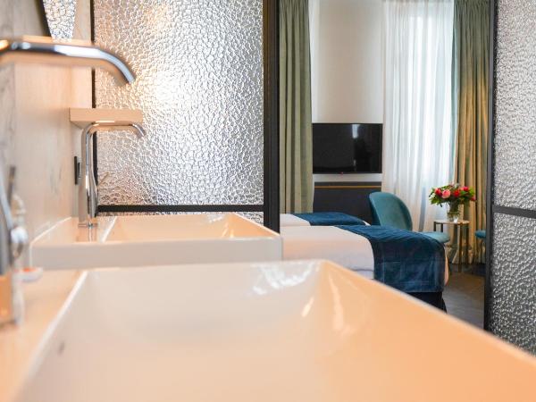 Amosa Liège City Centre Hotel : photo 8 de la chambre chambre lits jumeaux deluxe