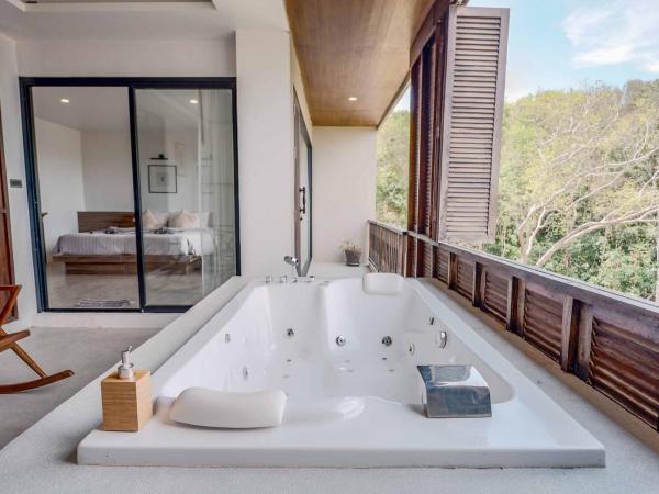 SriLanta Resort and Spa : photo 7 de la chambre suite forêt avec baignoire spa 