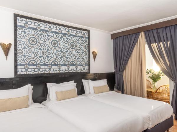 Odyssee Park Hotel : photo 1 de la chambre chambre triple