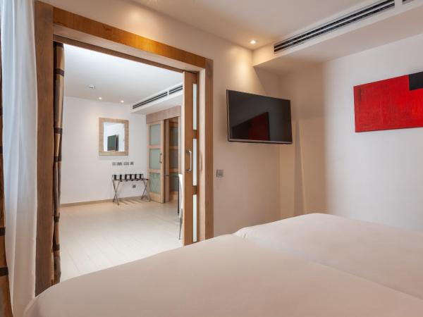 Melia Sevilla : photo 1 de la chambre chambre familiale