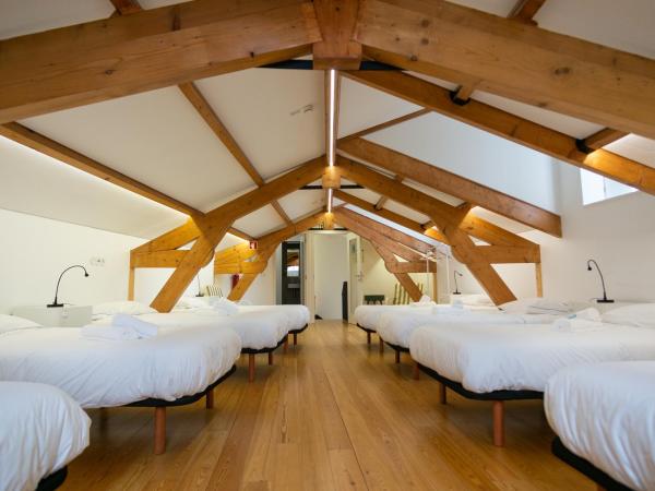Change The World Hostels - Coimbra - Almedina : photo 3 de la chambre lit simple en dortoir mixte (10 adultes)