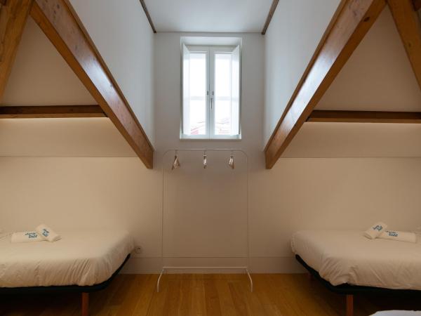 Change The World Hostels - Coimbra - Almedina : photo 6 de la chambre lit simple en dortoir mixte (10 adultes)