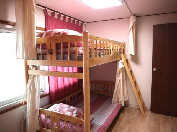 Jeong House : photo 1 de la chambre chambre familiale avec salle de bains commune