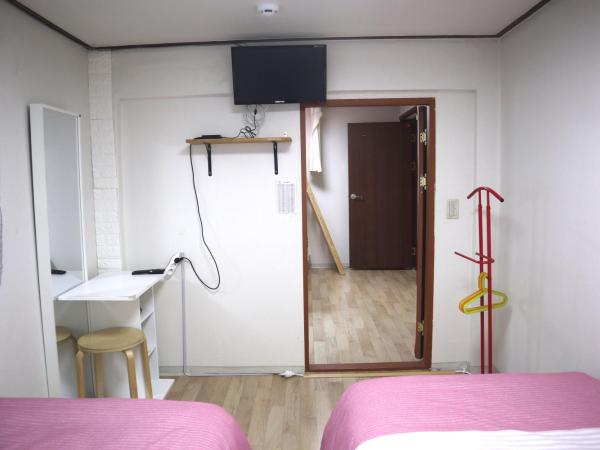 Jeong House : photo 4 de la chambre chambre familiale avec salle de bains commune