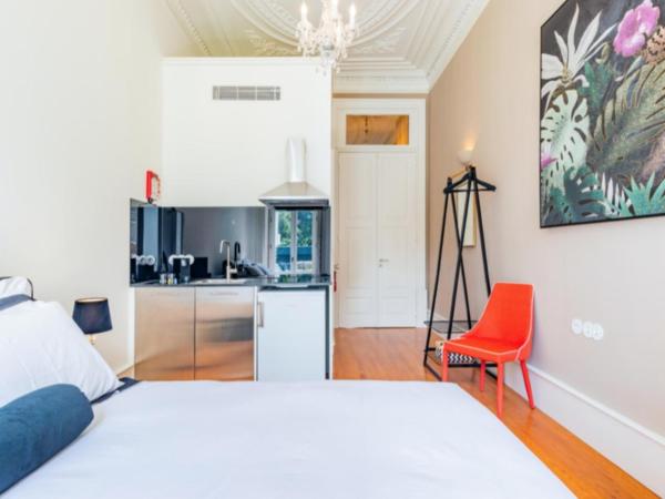 Maison Cabral : photo 4 de la chambre chambre lit queen-size - vue sur jardin