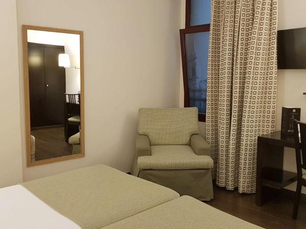 Hotel Conde Duque Bilbao : photo 2 de la chambre chambre lits jumeaux (2 adultes + 1 enfant)