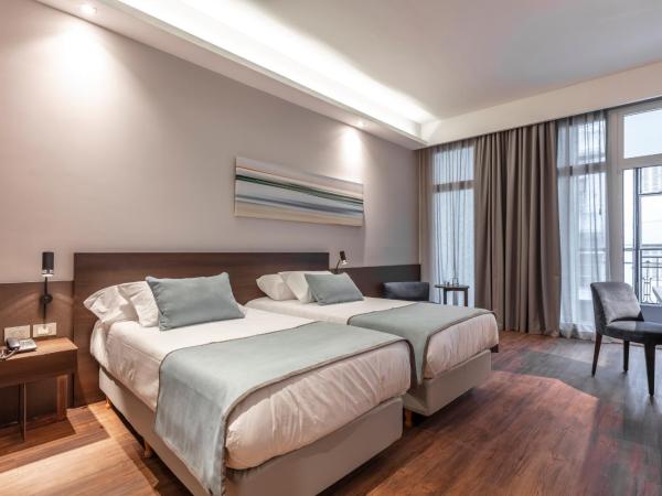 Huinid Obelisco Hotel : photo 1 de la chambre chambre double supérieure