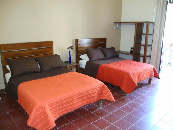 Hostel Hospedarte Centro : photo 9 de la chambre chambre quadruple avec salle de bains commune