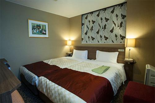 Hiroshima Intelligent Hotel Stadium Mae : photo 3 de la chambre chambre lits jumeaux Économique