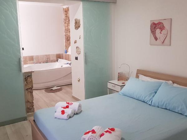 Il Daviduccio Suite : photo 4 de la chambre suite avec baignoire spa
