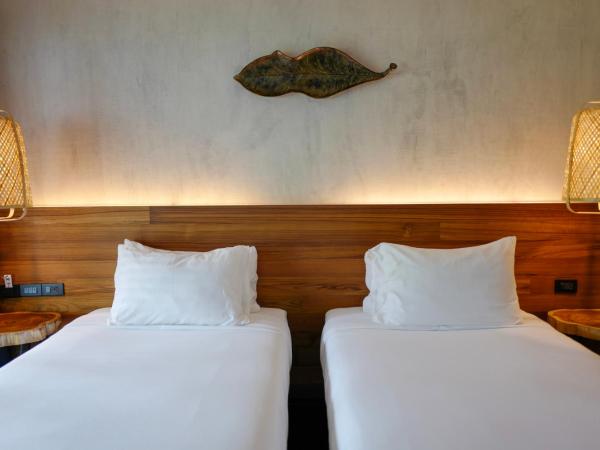 Nature Beach Resort : photo 1 de la chambre chambre lits jumeaux - située à l'avant