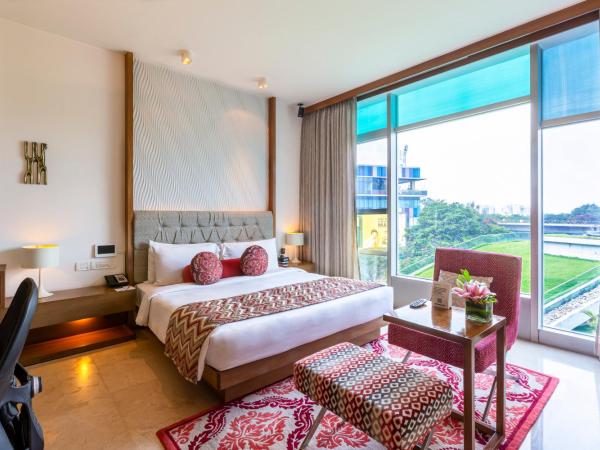 Vivanta Bengaluru, Whitefield : photo 5 de la chambre deluxe room garden view queen bed