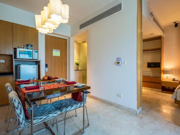 Vivanta Bengaluru, Whitefield : photo 2 de la chambre deluxe suite city view queen bed