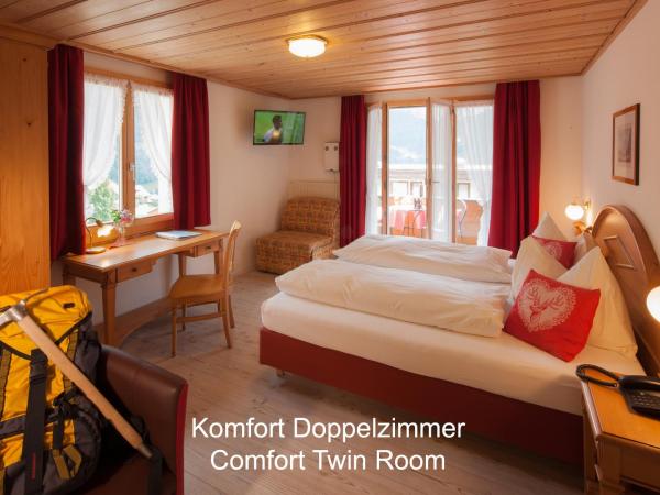 Hotel Hirschen - Grindelwald : photo 2 de la chambre chambre double avec balcon et vue sur la montagne