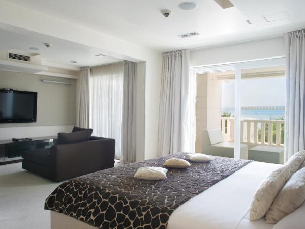 Damianii Luxury Boutique Hotel & Spa : photo 5 de la chambre suite de luxe avec terrasse et bain à remous - vue sur mer