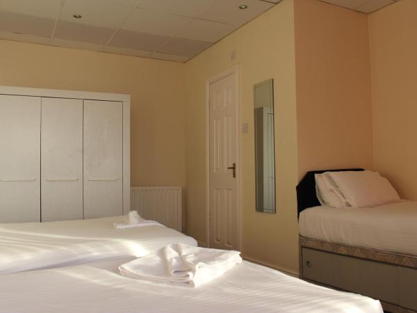 The Royal Windsor Hotel : photo 6 de la chambre chambre familiale - vue sur mer