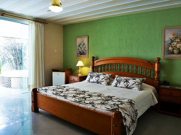 Pousada Marbella : photo 1 de la chambre suite deluxe avec lit king-size