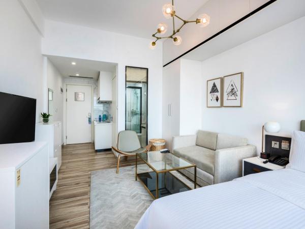 深圳金中环服务公寓-深业上城店 Golden Central Serviced Residence Shenzhen-UpperHills : photo 3 de la chambre chambre lit king-size exécutive