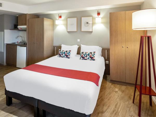 Appart'City Confort Mulhouse : photo 1 de la chambre studio avec lit double