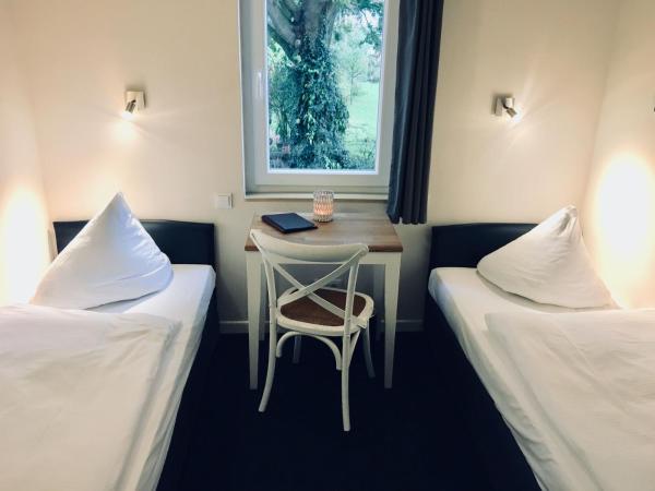 Arcade Hotel & Hostel Hamburg : photo 2 de la chambre chambre double ou lits jumeaux avec toilettes communes