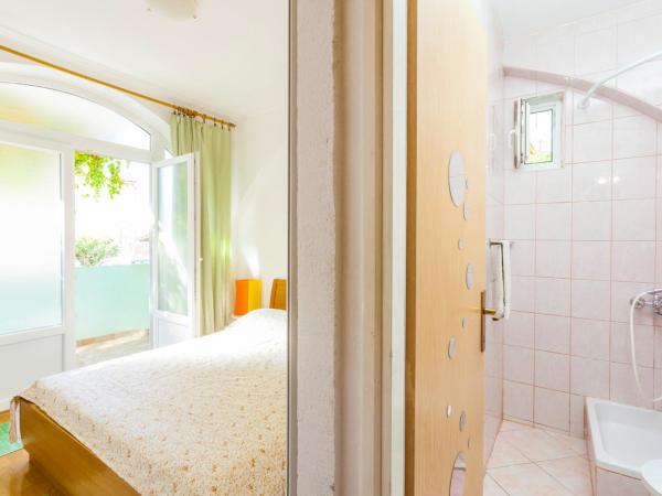 Green garden Rooms & Apartments : photo 8 de la chambre appartement - rez-de-chaussée