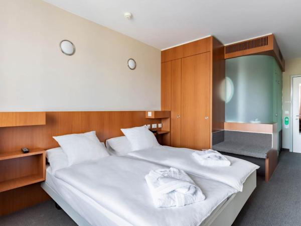 Hotel Cornavin Geneve : photo 2 de la chambre chambre lits jumeaux