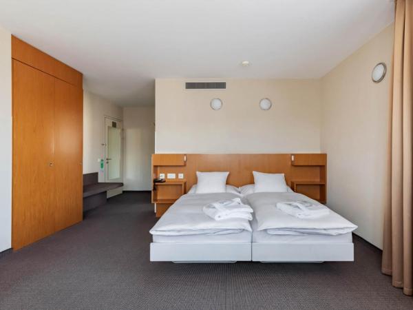 Hotel Cornavin Geneve : photo 3 de la chambre chambre triple