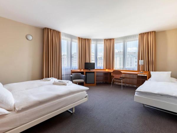 Hotel Cornavin Geneve : photo 1 de la chambre chambre triple