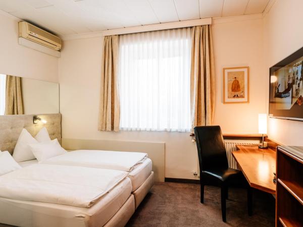 Hotel Römerstube : photo 3 de la chambre chambre lits jumeaux/double standard