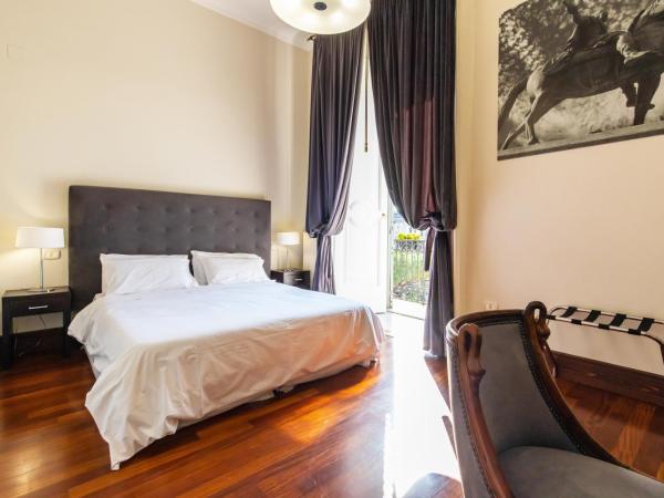 Gramsci Suites : photo 1 de la chambre chambre double standard