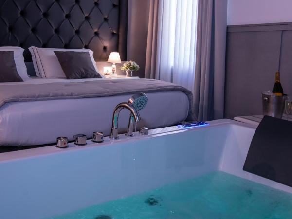Villa Elisio Hotel & Spa : photo 6 de la chambre chambre lit queen-size avec baignoire spa