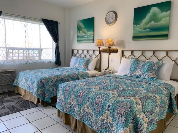 International Inn on the Bay : photo 2 de la chambre chambre double avec patio