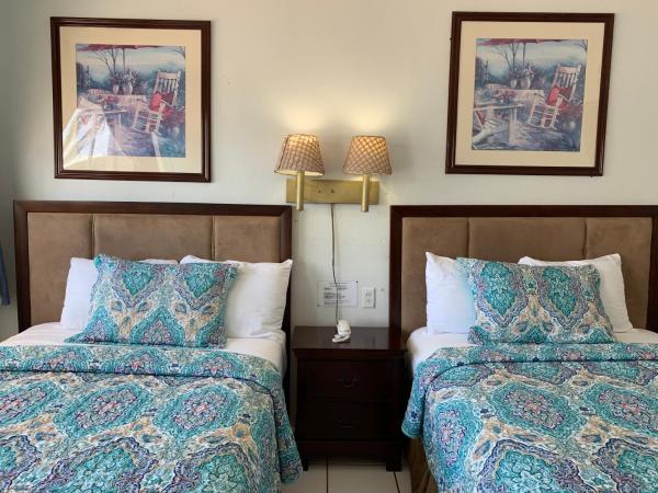 International Inn on the Bay : photo 9 de la chambre chambre double avec patio