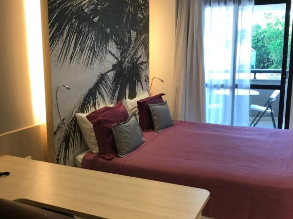 Boulevard Residencial : photo 1 de la chambre chambre lit queen-size avec balcon