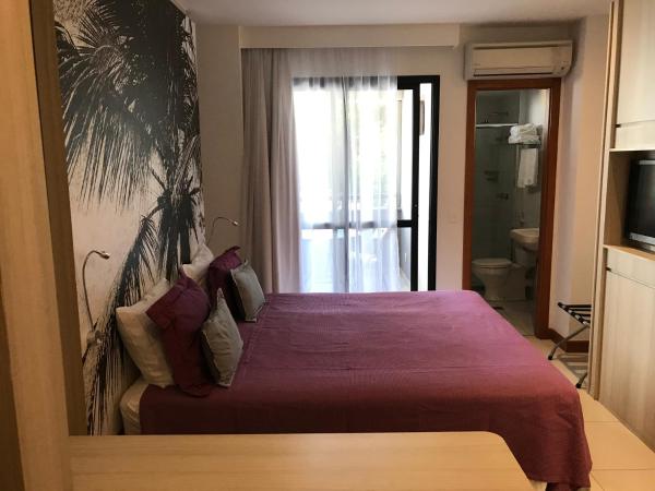 Boulevard Residencial : photo 3 de la chambre chambre lit queen-size avec balcon