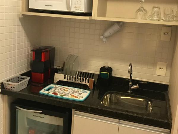 Boulevard Residencial : photo 8 de la chambre chambre lit queen-size avec balcon