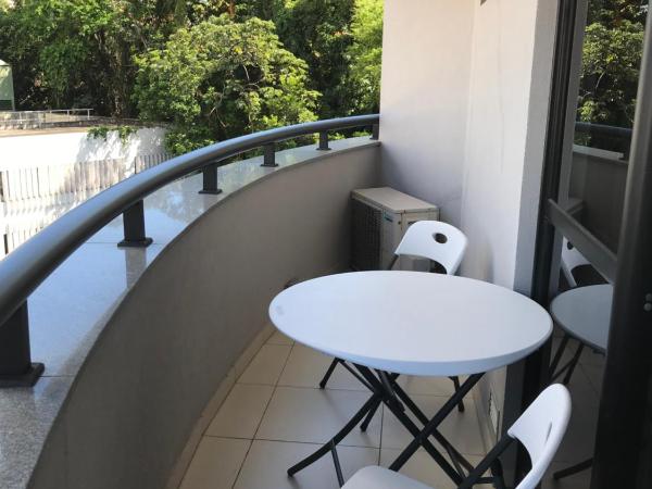 Boulevard Residencial : photo 10 de la chambre chambre lit queen-size avec balcon