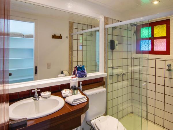 Chez Pitu Praia Hotel : photo 2 de la chambre chambre double deluxe - vue latérale sur mer