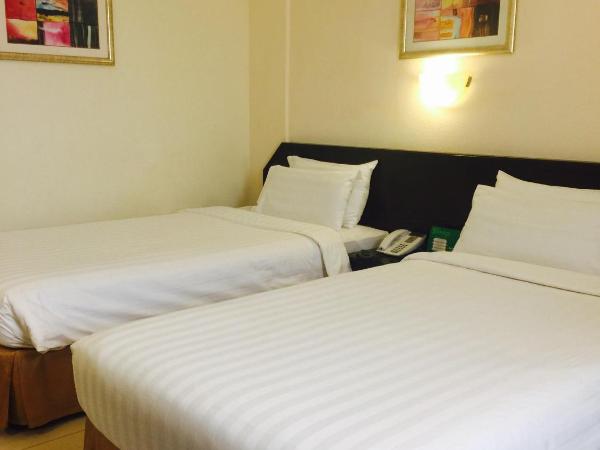 Hotel Al Madinah Holiday : photo 1 de la chambre chambre lits jumeaux