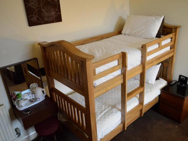 The Aspire : photo 4 de la chambre chambre familiale (2 adultes et 2 enfants)