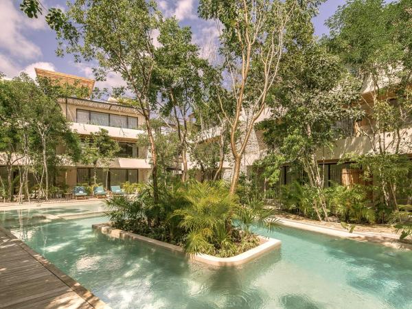 Copal Tulum Hotel : photo 6 de la chambre chambre double deluxe jungle avec terrasse et 1 lit king-size