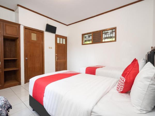 Super OYO 1778 Omah Duwet : photo 7 de la chambre chambre lits jumeaux standard