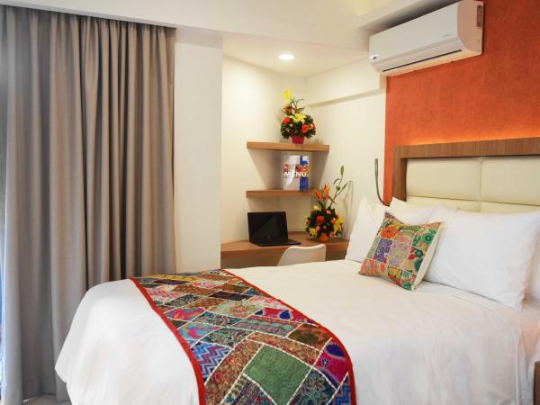 Hotel Boutique Dawat WTC : photo 1 de la chambre chambre lits jumeaux deluxe