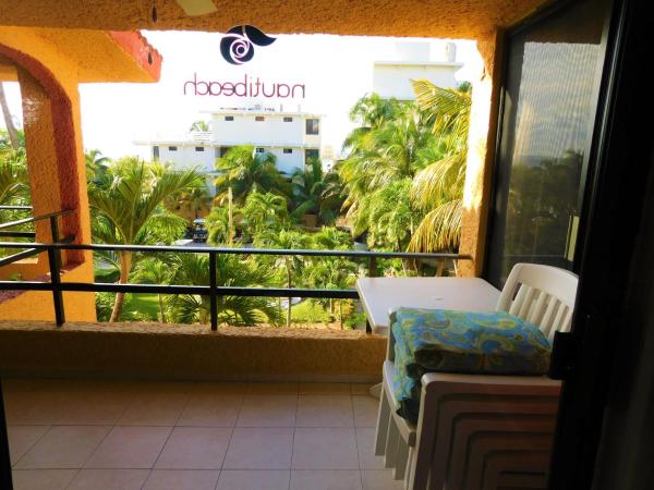 Nautibeach Beach Front Condos in North Beach : photo 4 de la chambre appartement - vue sur jardin