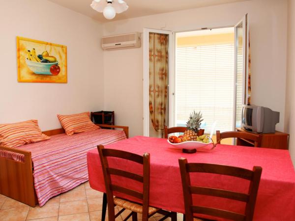 Casa Vacanze Cau : photo 1 de la chambre appartement 2 chambres (4 adultes)