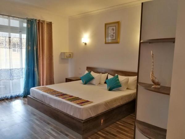 Easy Stay Residence : photo 4 de la chambre chambre double avec balcon - vue partielle sur mer