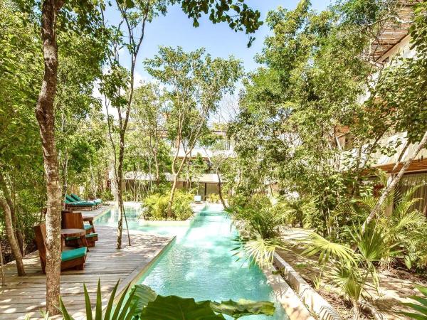 Copal Tulum Hotel : photo 7 de la chambre chambre double deluxe jungle avec terrasse et 1 lit king-size