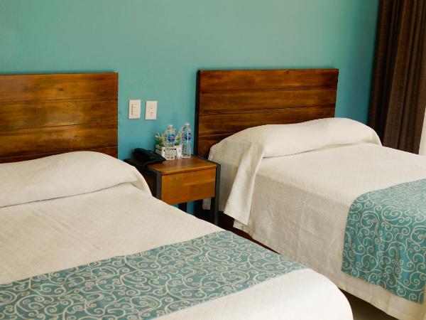 Acapulco Amor : photo 2 de la chambre chambre quadruple standard